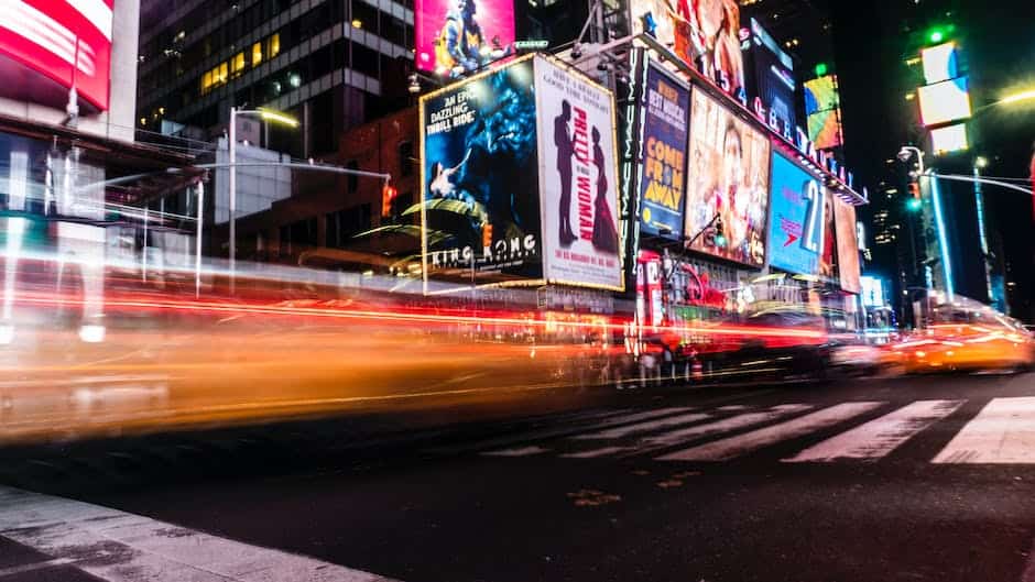 A blurry image of times square at night.