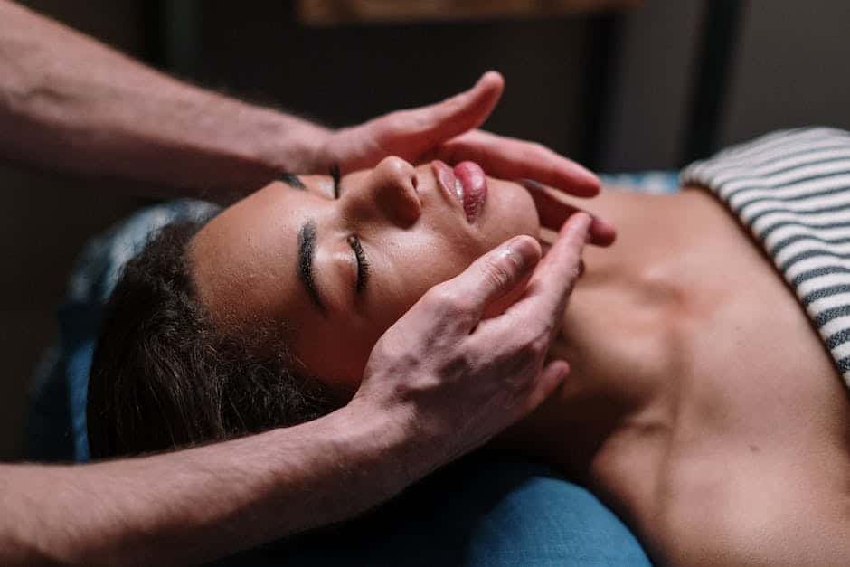 A woman getting a massage at a spa.