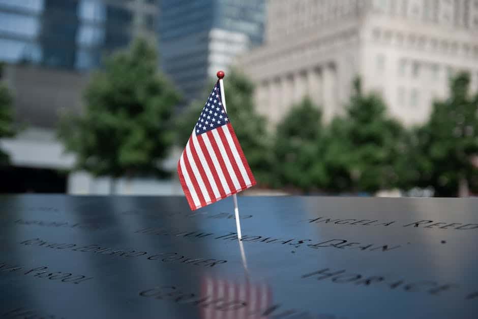 A flag sits on top of a memorial in new york city.